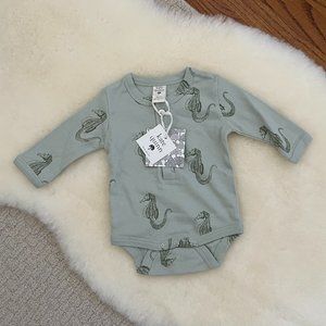 Kate Quinn seahorse henley body suit